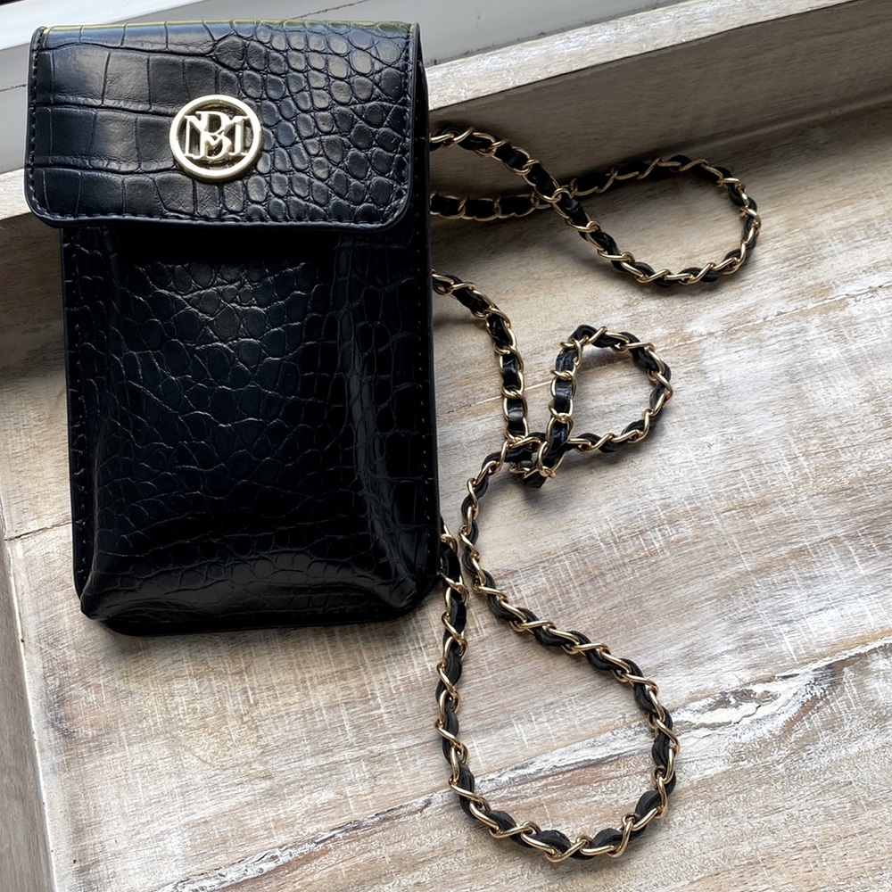 Black faux leather mini purse.